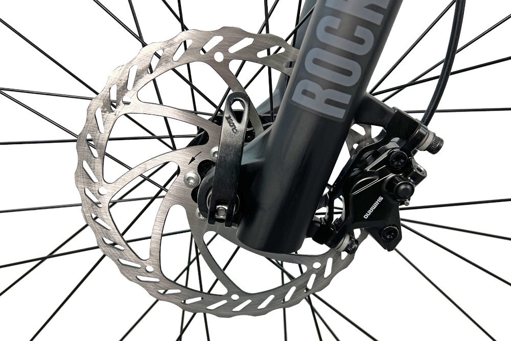 Rower górski MTB INDIANA X-Pulser 5.9 M21 29 cali Czarno-grafitowy podstawa bezpieczenstwa kazdego rowerzysty hamulce tarczowe hydrauliczne marki SHIMANO Acera duza sila hamowania do jazdy w kazdych warunkach pogodowych nakazdej trasie plyn hamulcowy precyzyjne okreslenie mocy hamowania odblaski lepiej widoczny na drodze bezpieczniejszy