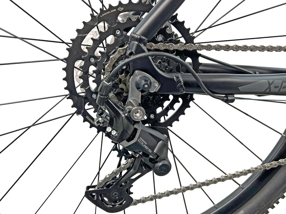 Rower górski MTB INDIANA X-Pulser 5.9 M21 29 cali Czarno-grafitowy tylna przerzutka SHIMANO CUES naped SHIMANO CUES niewiarygodnie plynna niezawodna zmiana przelozen wytrzymala 9 przelozen