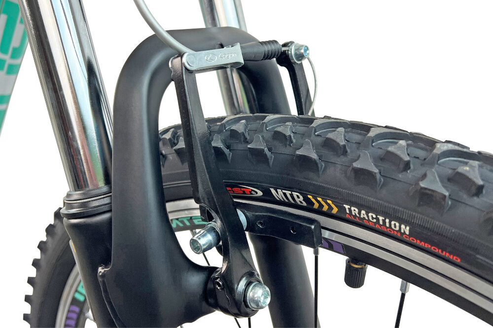 Rower górski MTB INDIANA X-Pulser 1.6 D15 26 cali damski Biało-fioletowo-miętowy hamulce V-Brake na przod na tyl lekkie duza sila hamowania odblaski lepiej widoczny na drodze bezpieczniejszy