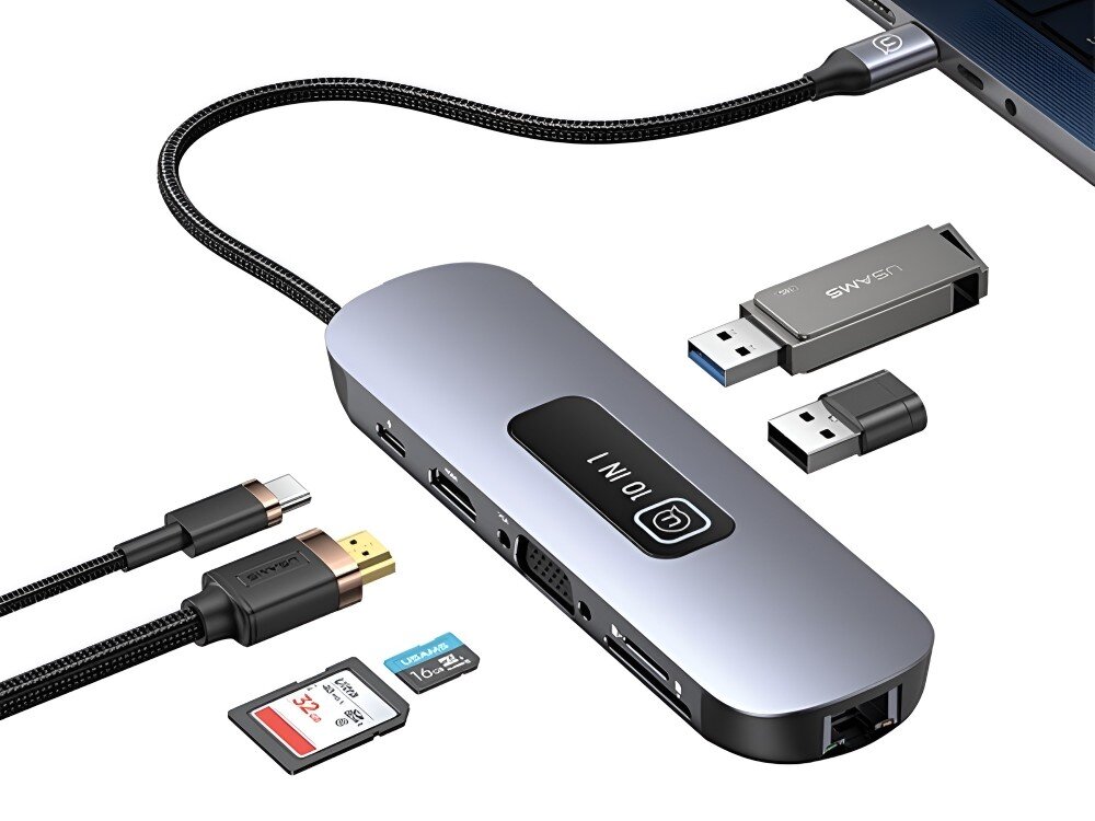 Hub USAMS SJ644HUB01 Hub USB-C z oznaczeniem 9 w 1 leży na białym tle wśród różnych akcesoriów, takich jak pendrive’y, karty pamięci, adaptery i przewody, 
            hub usb usbc 3.0 tf sd hdmi vga rj45