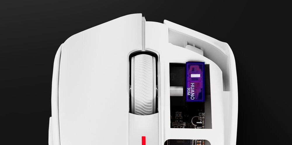 GENESIS Zircon 500 G2 przełączniki mechaniczne Huano 90M Purple 90 milionów kliknięć wyraźnemu punktowi aktywacji - mysz ze sciągnietym klawiszem, pod spodem widoczny przełącznik