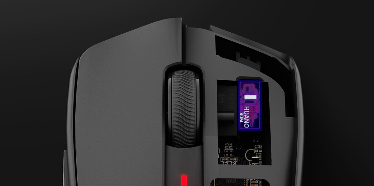 GENESIS Zircon 500 G2 przełączniki mechaniczne Huano M90 Purple 90 milionów kliknięć wyraźnemu punktowi aktywacji - mysz ze sciągnietym klawiszem, pod spodem widoczny przełącznik