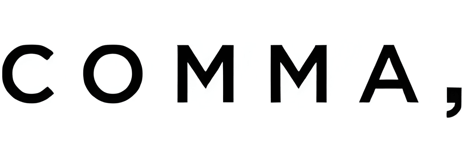 Logo z napisem \'COMMA,\'.