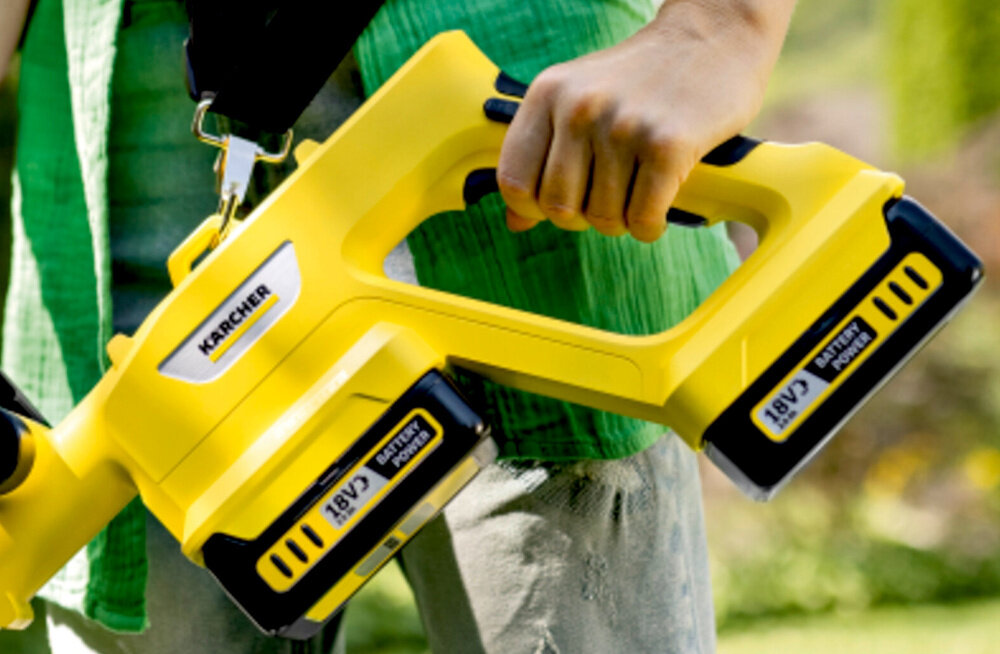 Podkaszarka akumulatorowa KARCHER 1.445-450.0 seria KARCHER 18 V dwa akumulatory litowo-jonowe lacznie 36 V mocy wyswietlacz LCD stan naladowania baterii w czasie rzeczywistym stala kontrola oszczednosc
