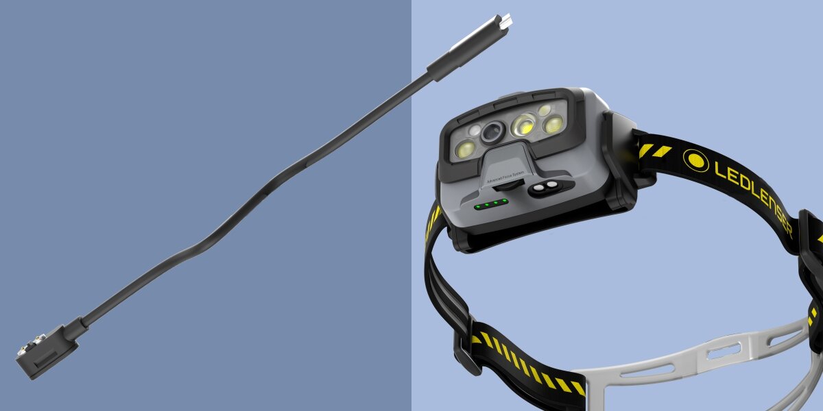 Latarka czołowa LEDLENSER HF8R Work, Wygodne ładowanie, Latarka pokazana od dołu, w tle kabel ładujący
