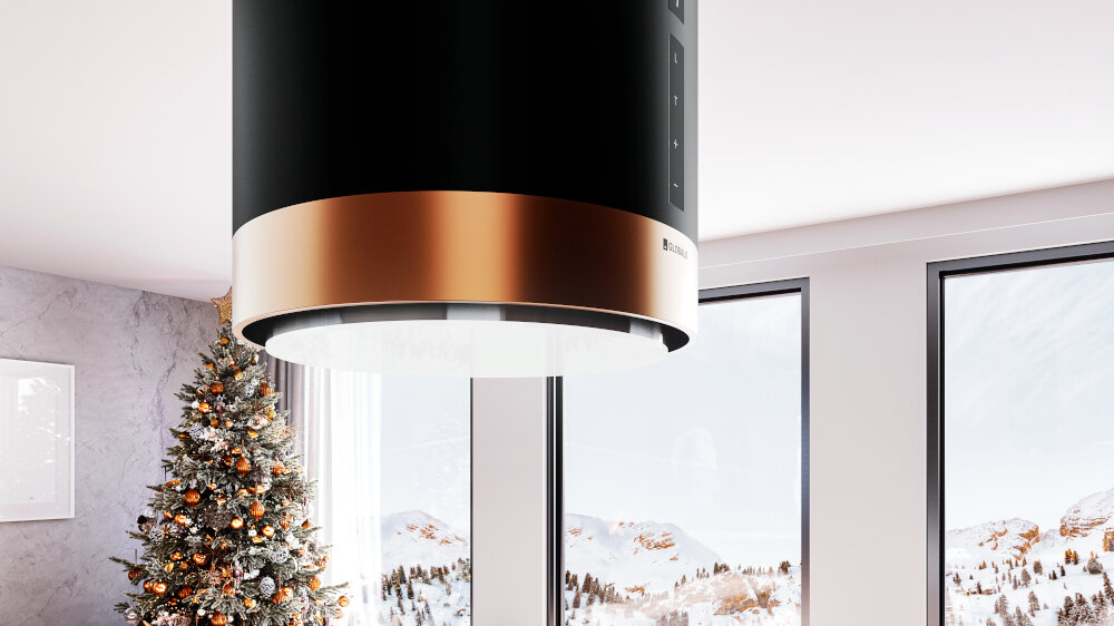 Okap GLOBALO Heweno Isola 39.2 Czarny miedziany mat Zdjęcie przedstawia zbliżenie na dolną część cylindrycznego okapu kuchennego marki GLOBALO, z wyraźnie widocznym, okrągłym panelem LED odpowiadającym za równomierne, jasne oświetlenie powierzchni roboczej. Widoczny jest minimalistyczny design oraz dotykowy panel sterowania oświetlenie led naturalne światło komfort gotowania widoczność w kuchni gotowanie wieczorne energooszczędne oświetlenie led okap oświetlenie kuchenne