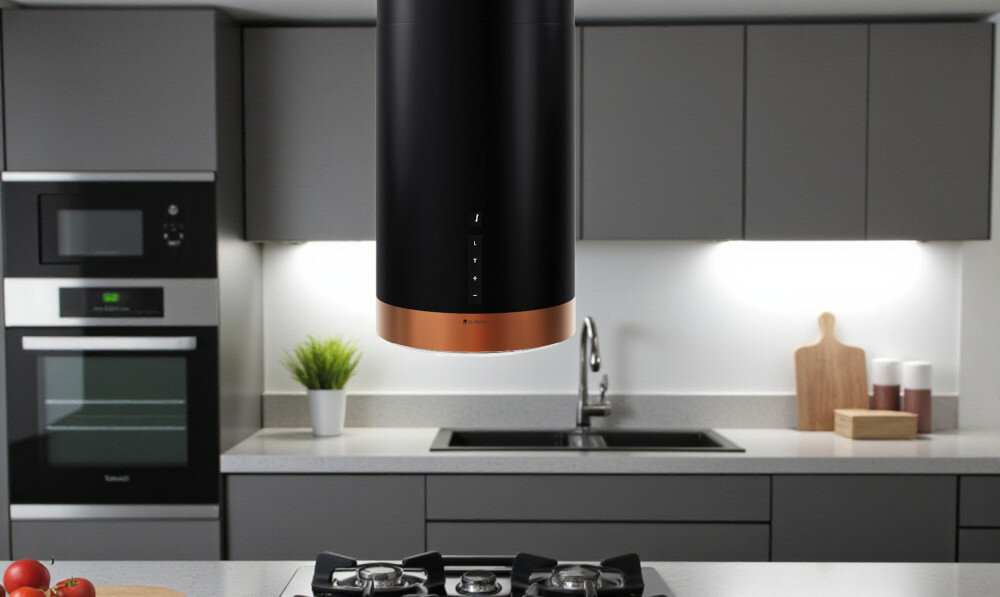 Okap GLOBALO Heweno Isola 39.2 Czarny miedziany mat Zdjęcie przedstawia zbliżenie na dolną część cylindrycznego okapu kuchennego marki GLOBALO, z wyraźnie widocznym, okrągłym panelem LED odpowiadającym za równomierne, jasne oświetlenie powierzchni roboczej. Widoczny jest minimalistyczny design oraz dotykowy panel sterowania filtr aluminiowy pochłanianie tłuszczu okap filtr tłuszczowy tryb pochłaniacza filtry węglowe eliminacja zapachów oczyszczanie powietrza kuchnia świeże powietrze