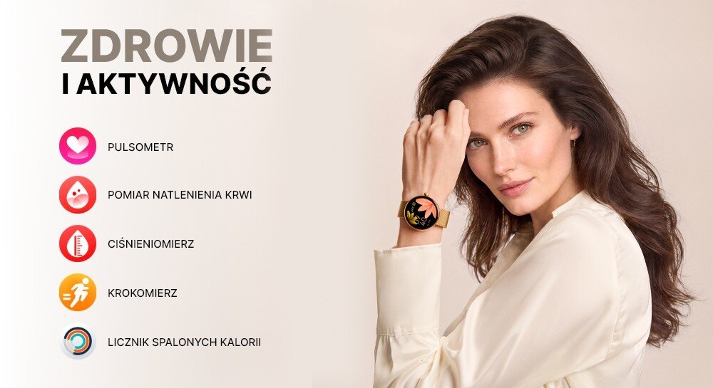 Osoba w białej koszuli prezentuje smartwatch na nadgarstku. Po lewej stronie widnieje tekst: \'ZDROWIE I AKTYWNOŚĆ\', a poniżej ikony z napisami: \'PULSOMETR\', \'POMIAR NATLENIENIA KRWI\', \'CIŚNIENIOMIERZ\', \'KROKOMIERZ\', \'LICZNIK SPALONYCH KALORII\'.