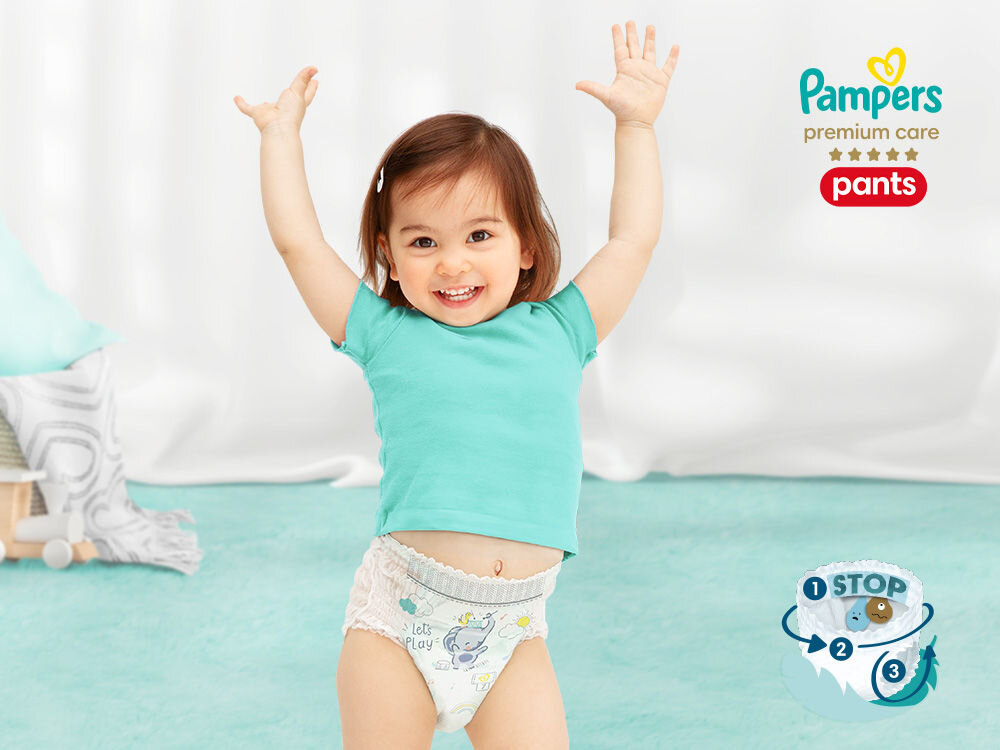 Pieluchomajtki PAMPERS Premium Care 3 (28 szt.) dziewczynka w pieluchomajtkach