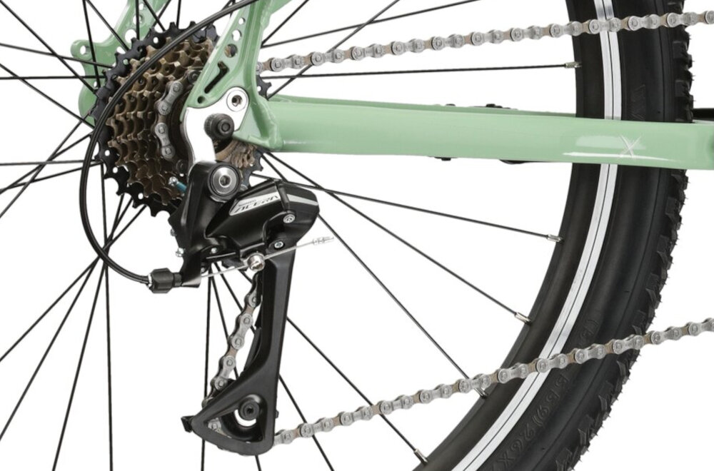 Rower górski MTB KROSS Berg 1.0 D15 26 cali damski Zielony 21 przelozen przednia przerzutka SHIMANO Tourney tylna przerzutka SHIMANO Acera przezutki SHIMANO duza wytrzymalosc precyzyjne dzialanie plynna bezproblemowa zmiana biegow