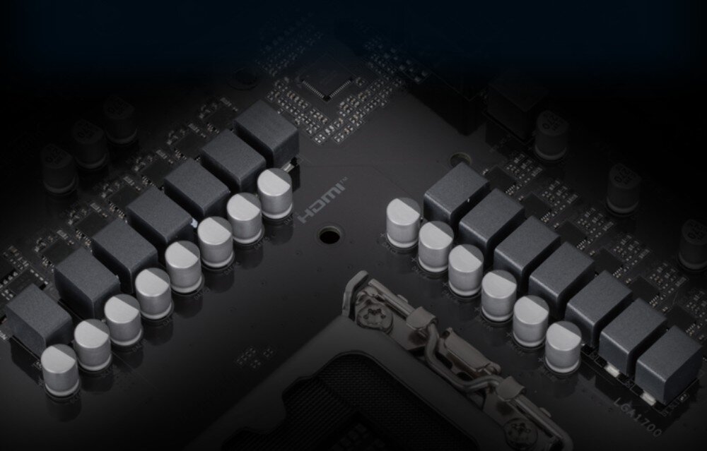 Płyta główna GIGABYTE Z790 Eagle AX Rzędy szarych dławików i kondensatorów układu zasilania przy gnieździe CPU