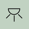 Ikona przedstawia czarny symbol przypominający lampę na jasnym tle.