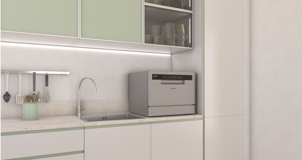 Zmywarka CANDY CP 6E51LS program eco mycie ekologiczne mniejsze zużycie wody oszczędności 6 kompletów naczyń pojemność zmywarki wnętrze program szybki 35 minut mycie suszenie oszczędności do małych kuchni oszczędność miejsca kompaktowe urządzenie wymiary 44,3 cm x 55 cm x 50 cm