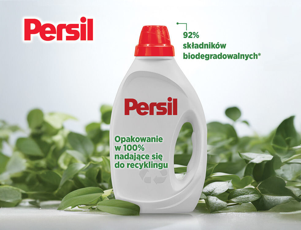 Żel do prania PERSIL Reklama ekologiczna Persil. Butelka żelu bez etykiety, na tle zielonych liści. Widoczny napis: Opakowanie w 100% nadające się do recyklingu oraz informacja: 92% składników biodegradowalnych