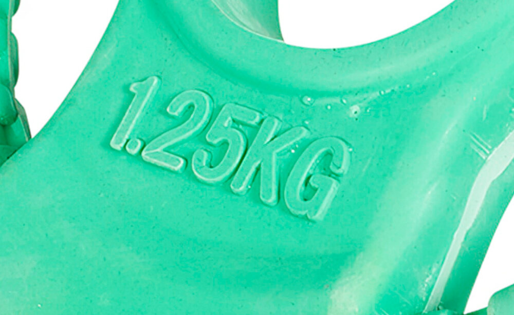 Obciążenie GORILLA SPORTS Grip 51 (1.25 kg) Miętowy białe tło zbliżenie na oznaczenie wagi wyraźne oznaczenie masy na powierzchni otwór 51 mm pasuje do popularnych gryfów sprzyja skupieniu na technice i pomaga ćwiczyć regularnie