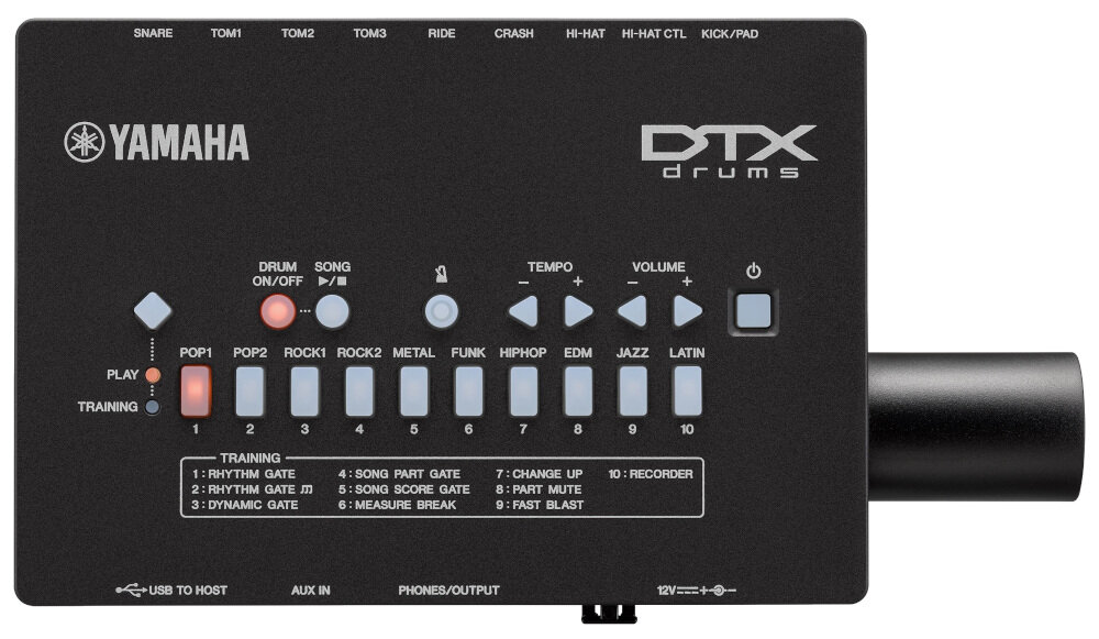 Panel sterowania perkusji elektronicznej z logo \'YAMAHA\' i \'DTX drums\'. Widoczne są przyciski do wyboru stylów muzycznych, regulacji tempa i głośności oraz porty USB i AUX.
