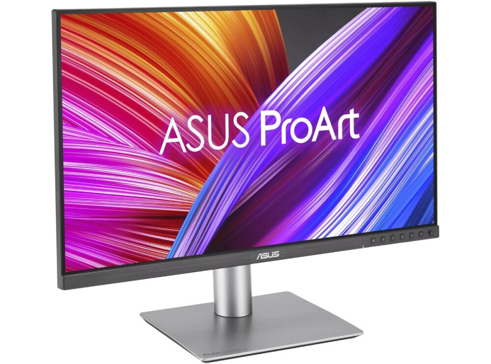 Monitor ASUS ProArt PA24ACRV Monitor ukazany z profilu pod kątem, stojący na kwadratowej stopie. Na ekranie znajduje się napis 'ASUS ProArt' na tle kolorowych linii