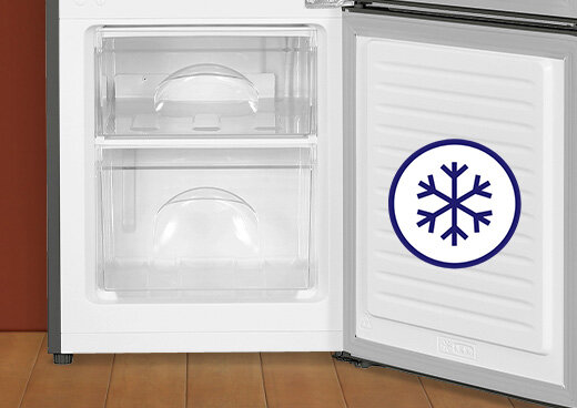 Zbliżenie na zamrażalnik dolny lodówki MPM-108-KB-45. Ikona płatka śniegu.