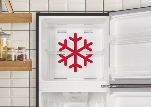 Zbliżenie na zamrażalnik górny. Ikona płatka śniegu.