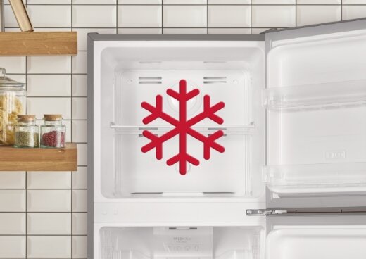 Zbliżenie na zamrażalnik górny. Ikona płatka śniegu.