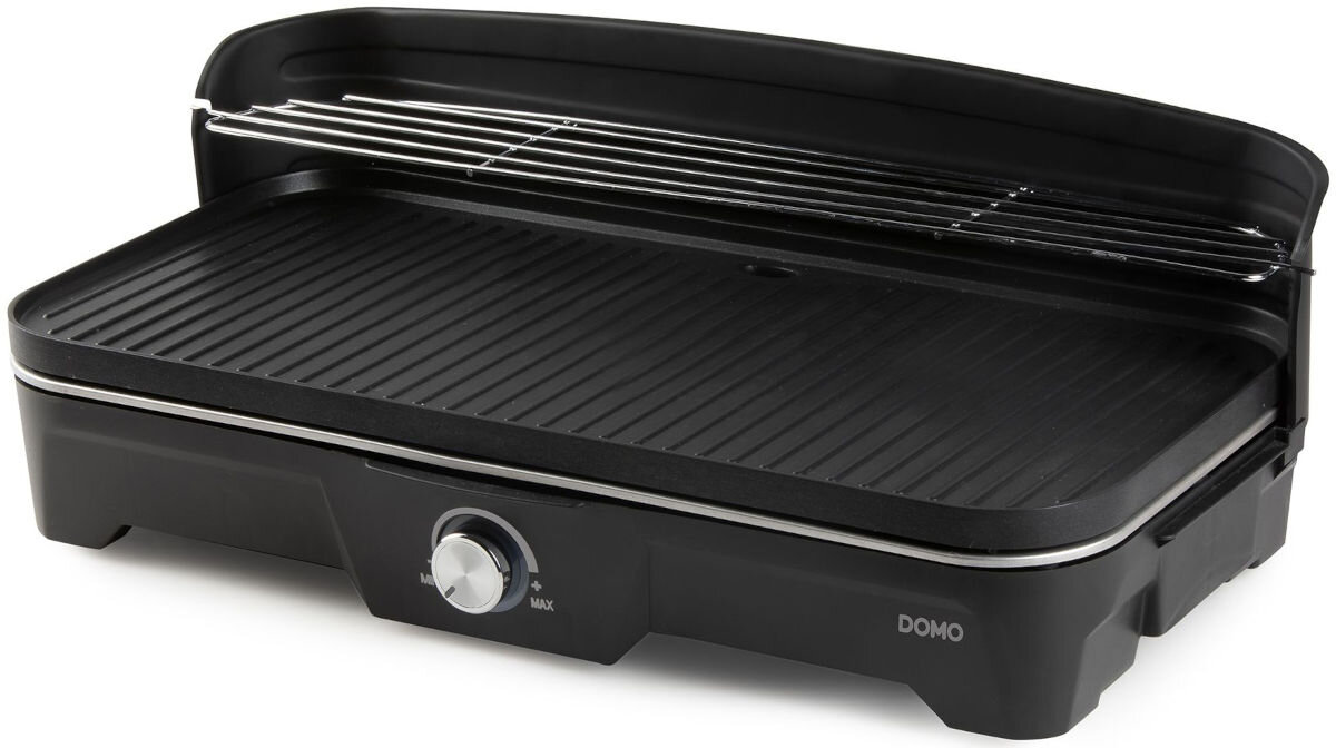Grill elektryczny DOMO DO9260G, aromatycznych, powierzchnia, wymiary, Ryflowana, Grill elektryczny DOMO DO9260G z widocznym chromowanym rusztem, płytą grillową i pokrętłem regulacji temperatury, widok z przodu.