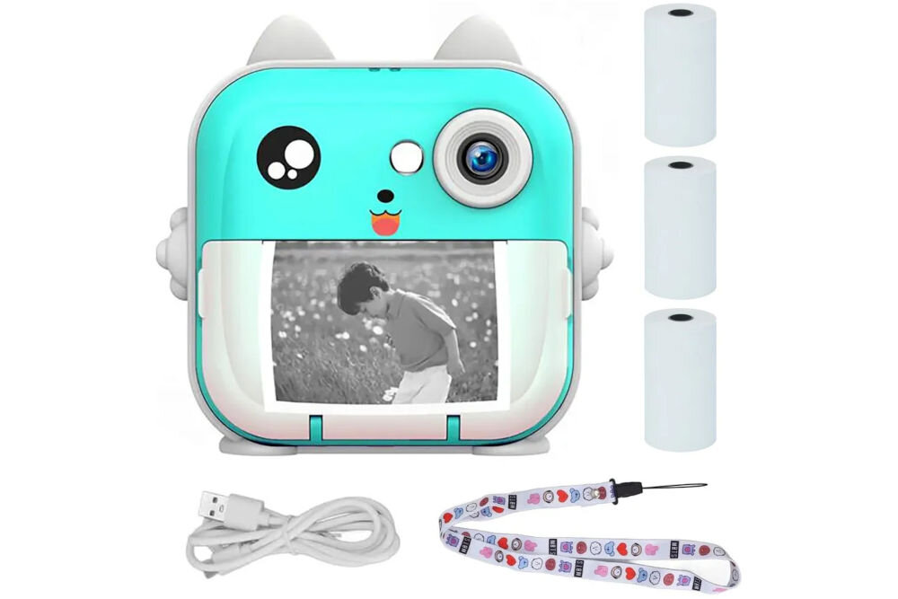 Drukarka EXTRALINK EPP-004 Złącze USB Niebieski aparat natychmiastowy w kształcie kotka, drukujący czarno-białe zdjęcie, obok trzy rolki papieru termicznego, kabel USB i smycz rozdzielczość prędkość druku tworzenie etykiet technologia termiczna nie generuje hałasu