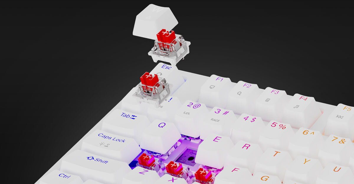 GENESIS Thor 230 TKL Wireless Outemu Red liniowej charakterystyce technologii hot-swap przełączniki 3-pinowe - Klawiatura z widocznymi przełącznikami i zdjętą nakładką z klawisza.