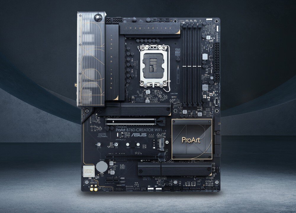 Płyta główna ASUS ProArt B760-Creator WiFi Widok z góry na czarną płytę główną z napisem 'ProArt' na osłonie chipsetu i srebrnym gniazdem procesora LGA 1700 pośrodku, opis