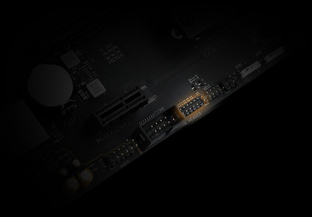 Płyta główna ASUS ProArt B760-Creator WiFi Zbliżenie na dolną część płyty głównej z widocznym nagłówkiem opisanym jako 'TB HEADER', złączem PCIe x1 oraz baterią podtrzymującą ustawienia BIOS, złącze Thunderbolt 4, przeznaczenie