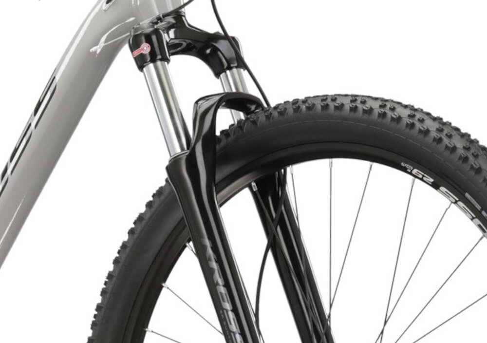 Rower górski MTB KROSS Level 3.0 M19 29 cali męski Szary rower typu hardtail przedni amortyzator SR Suntour typu XCM RL skok o wysokosci 100 mm ulatwia najezdzanie na przeszkody niweluje wstrzasy regulacja skoku za pomoca manetki zmniejsza sile uderzenia przedniego kola o przeszkode do jazdy na nierownej wyboistej nawierzchni