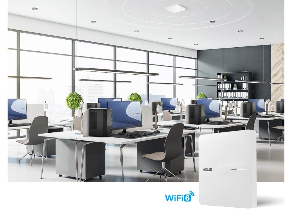 Punkt dostępu ASUS ExpertWiFi EBA63 Nowoczesna przestrzeń biurowa z rzędami stanowisk komputerowych i białym urządzeniem sieciowym wyeksponowanym na pierwszym planie