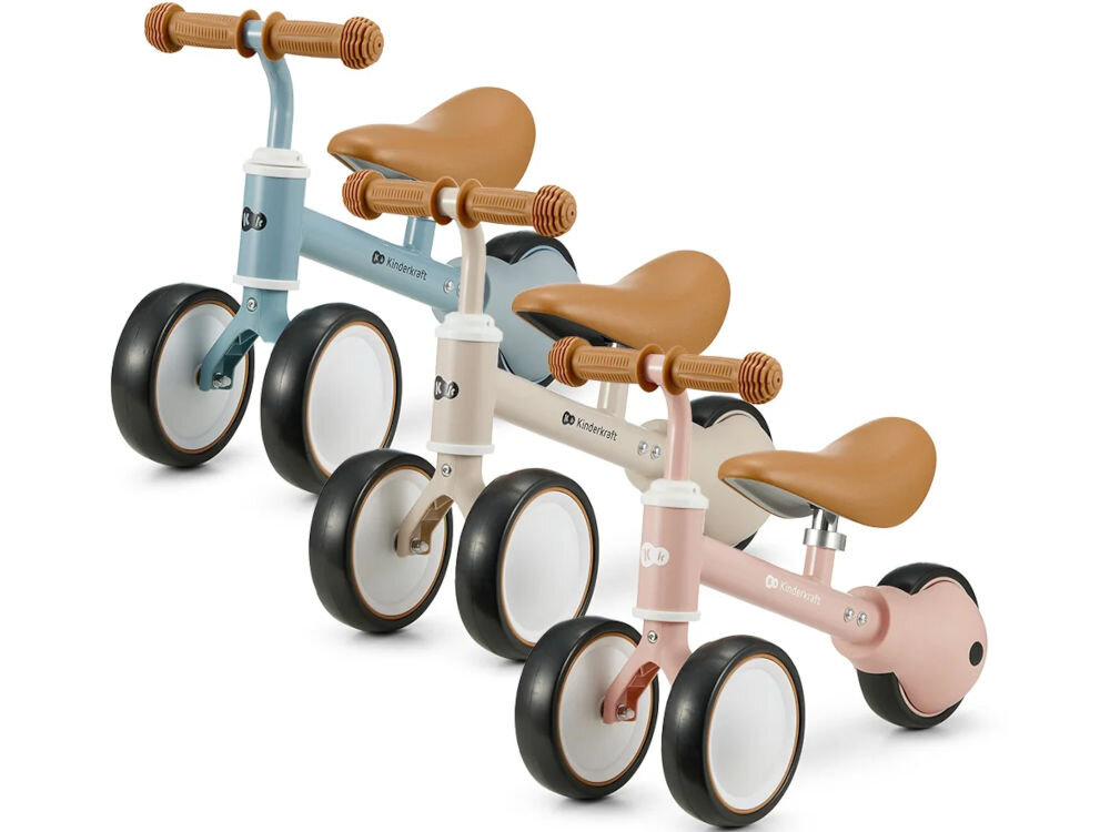 Kinderkraft rowerek biegowy CUTIE LIGHT BEIGE białe tło trzy rowerki beżowy różowy i niebieski brązowe siodełka gumowe uchwyty funkcjonalność estetyka subtelne pastelowe barwy stylowe wzornictwo brak ostrych krawędzi zaokrąglona konstrukcja precyzyjne wykonanie praktyczny pojazd urocza zabawka