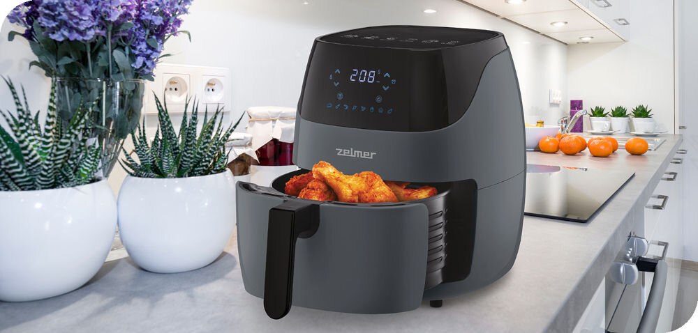Frytownica ZELMER ZAF5502G pojemność 5 l moc 1500 W smażone potrawy ograniczenie użycia tłuszczu 8 programów automatycznych ulubione dania intuicyjny panel dotykowy regulacja temperatury w zakresie od 80 do 200 stopni zdrowsze posiłki 