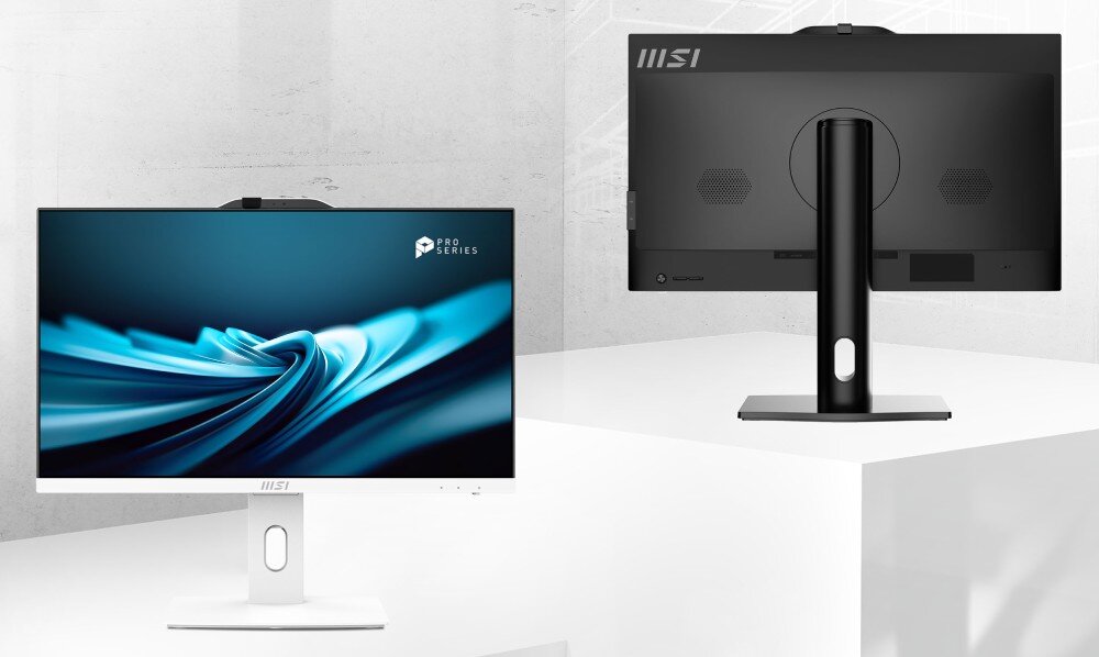 Komputer MSI Pro AP242P 14M-691EU Dwa monitory stojące na białym tle, jeden z przodu z niebieskim wzorem na ekranie, drugi od tyłu z widocznymi otworami wentylacyjnymi, procesor rdzenie prędkość wątki układ graficzny