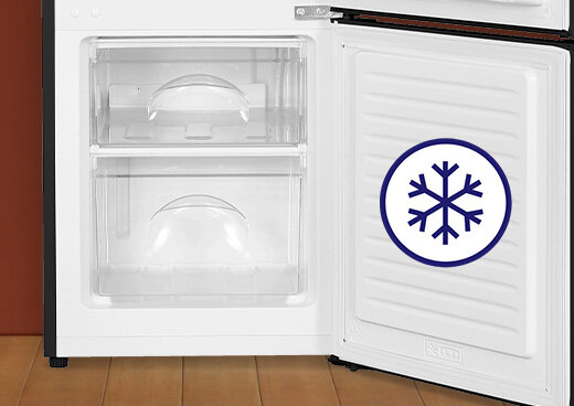 Zbliżenie na zamrażalnik dolny lodówki MPM-108-KB-44. Ikona płatka śniegu.