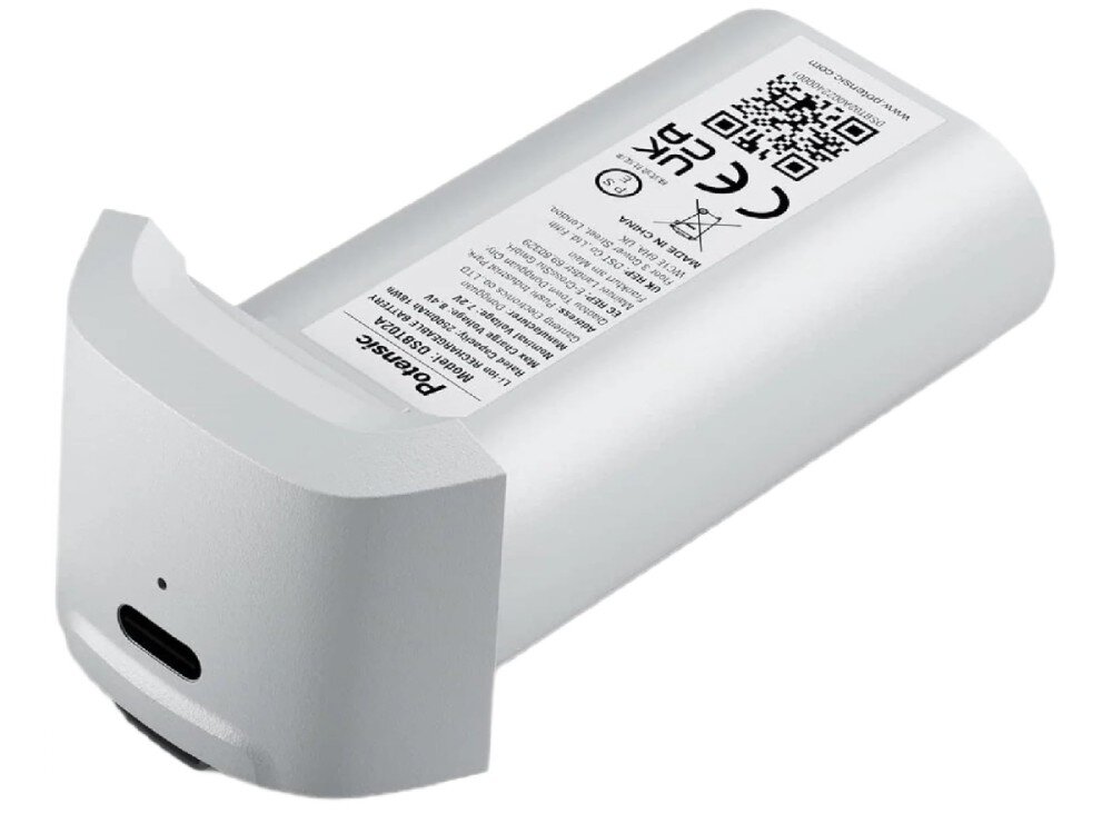 Akumulator POTENSIC do Atom 4K Etykieta znamionowa na spodzie białego akumulatora zawierająca specyfikację techniczną kod QR i symbole ostrzegawcze