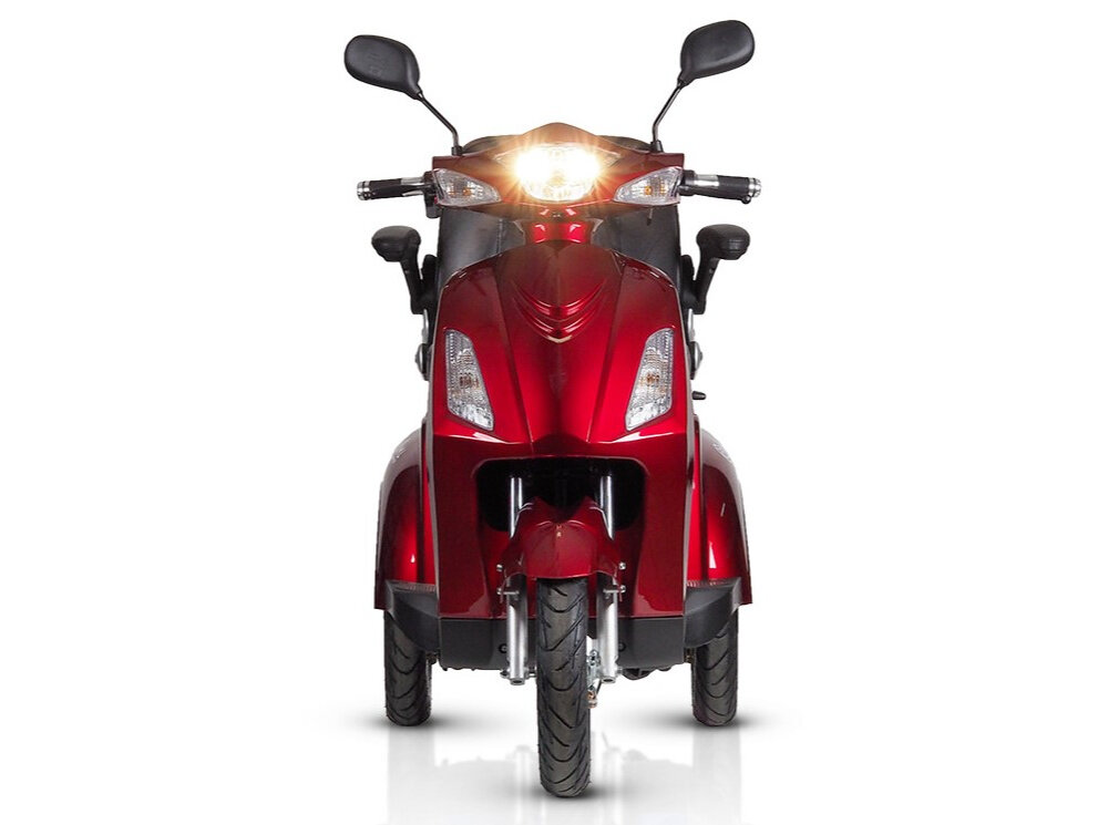 Skuter elektryczny IML Life Czerwony skuter widoczny od przodu swiecaca lampa przednie i tylne swiatla LED kierunkowskazy wyrazne latwe w obsludze bezpieczenstwo na drodze