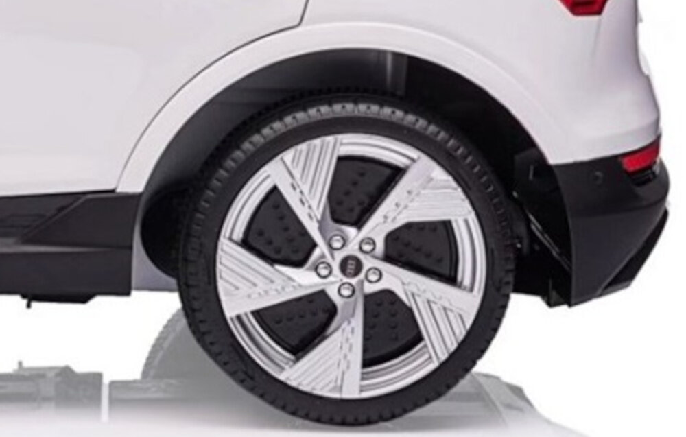Samochód dla dziecka MILLY MALLY Audi E-Tron Sportback 4x4 Biały metalowe osie kol kola srednica 21 cm trwalosc stbilnosc solidne wykonanie kol pianka EVA dluga zywotnosc duza odpornosc na uszkodzenia sprezynowe zawieszenie plyna jazda dobrze tlumi wstrzasy