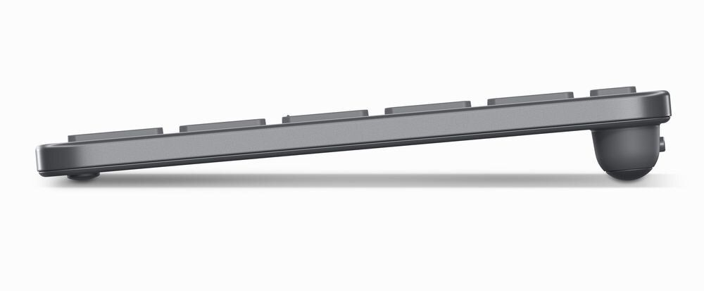 Profil klawiatury w kolorze szarym, widoczny z boku, z lekko uniesioną tylną częścią. Klawisze są płaskie i równomiernie rozmieszczone.