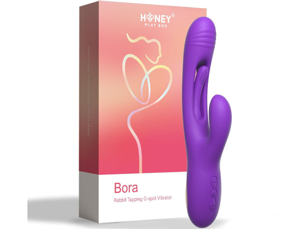 HONEY PLAY BOX Bora Purple wibrator króliczek do punktu G pukający stojący fioletowy wibrator wypustki przyciski obok stoi opakowanie białe tło elegancki fioletowy kolor stylowy wygląd 24,39 cm długości 5,69 cm wysokości 3,56 cm szerokości waga wynosi 231,33 g w domu podczas podróży jakość maksymalna satysfakcja z każdej chwili
