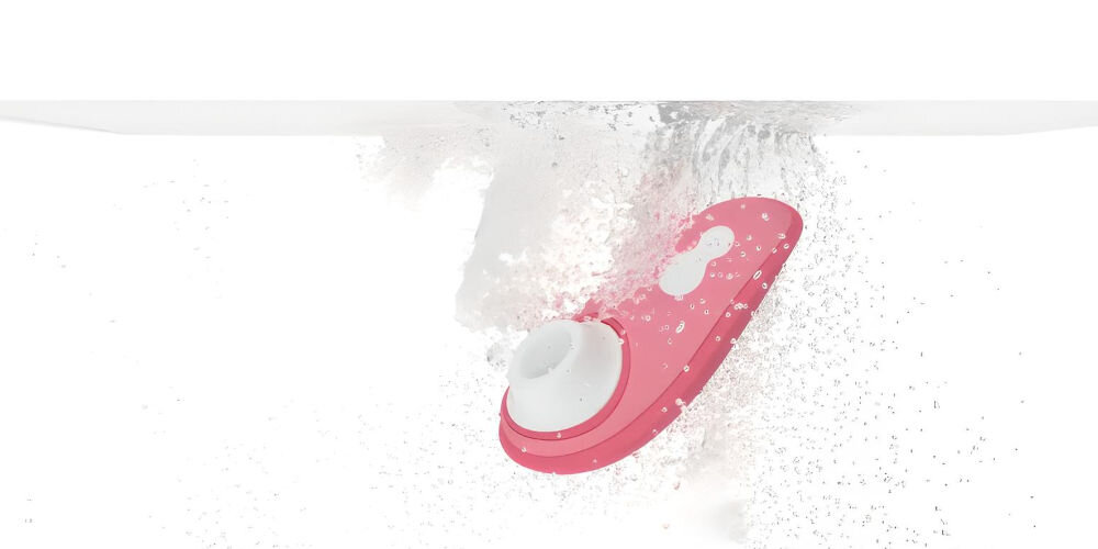 WOMANIZER Liberty 2 Vibrant Rose bezdotykowy masażer łechtaczki masażer pod wodą bąbelki białe tło białe elementy elegancja i technologia pełna wodoodporność klasy IPX7 wyjątkowe doznania relaksująca kąpiel w wannie odświeżający prysznic w basenie solidna konstrukcja bezproblemowe działanie pod wodą różne sposoby na przyjemność dla miłośników wodnych przygód