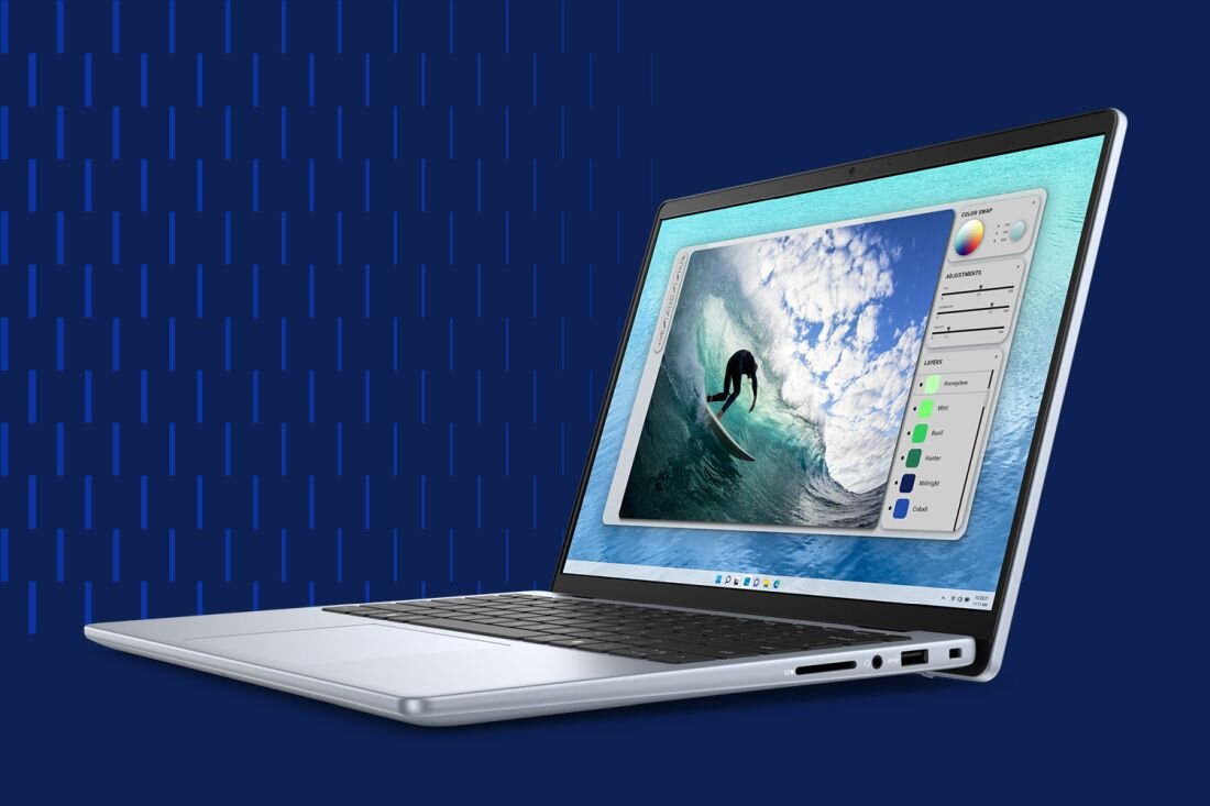 Laptop DELL Inspiron 5440 - Laptop DELL Inspiron 5440 z obrazem deski surfingowej na ekranie, ilustrujący harmonię między technologią a stylem życia. FHD+ (1920 x 1200 px) ComfortView  