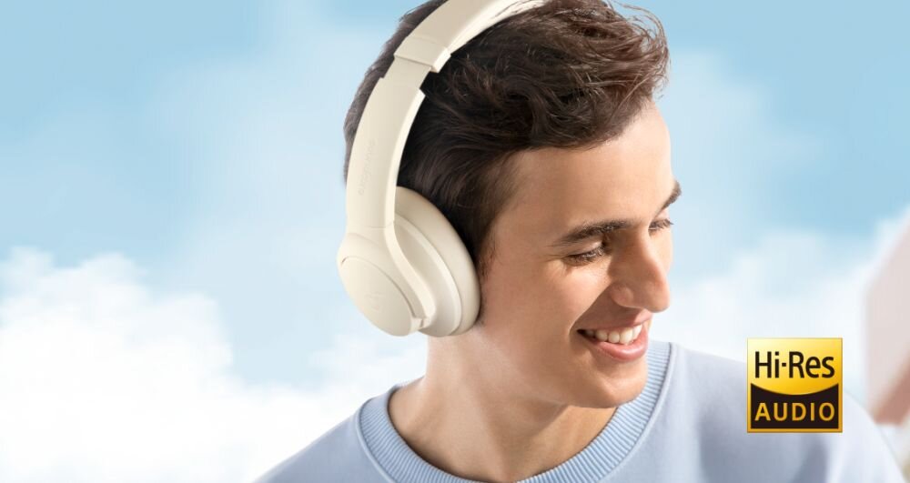 Słuchawki nauszne SOUNDCORE Q20i muzyka, dzwiek, sluchawki na niebieskim tle