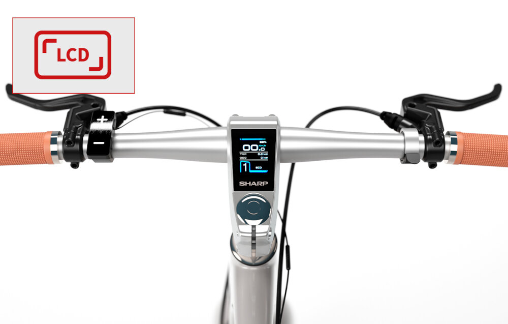 Rower elektryczny SHARP BK-RS08-ES M21 Srebrny zbliżenie na kierownicę włączony wyświetlacz w lewym górnym rogu ikona z napisem LCD kolorowy wyświetlacz LCD czytelność wszystkich wyświetlanych informacji