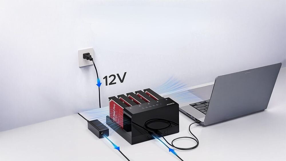 ORICO 6558US3-C-EU-BK1 ORICO 6558US3-C-EU-BK1 ciągłość działania, porządek w zasobach wygodne zarządzanie nośnikami backupach, archiwizacji i codziennej obsłudze danych firmowych - schemat podłączenia stacji z laptopem i prądem