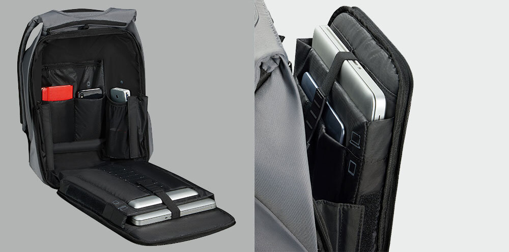 Plecak na laptopa SAMSONITE Securipak 2.0 15.6 cali wygodna organizacja wnętrza, przemyślane wnętrze, liczne kieszenie i przegrody, specjalnie zaprojektowane kieszenie na
laptopa do 15,6, tablet do 10,5, dokumenty, telefon oraz powerbank,
otwarty plecak na szarym tle, wewnątrz plecaka laptop, tablet, telefon, powerbank, notes