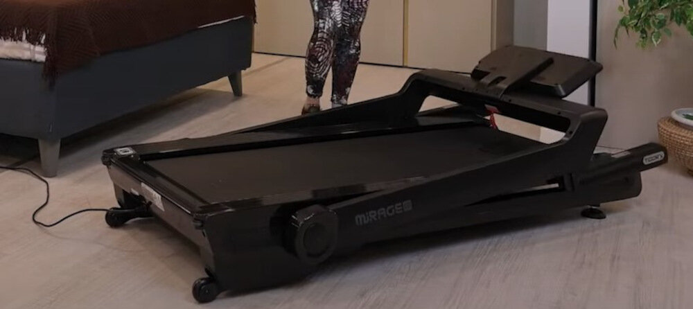 Bieżnia elektryczna TOORX Mirage C60 B 2940W 18km-h skladna konstrukcja wymiary 77 x 30 x 163 cm elegancki wyglad kolka transportowe