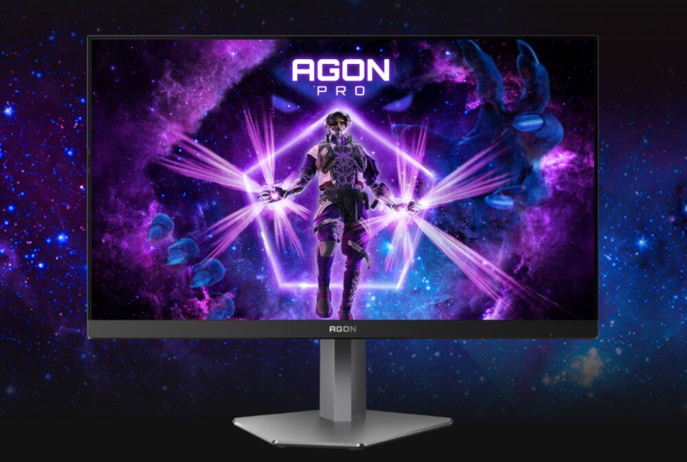 Monitor AOC Agon Pro AG246FK Monitor z wyświetloną grafiką postaci na tle galaktyki, ustawiony na metalicznej podstawie z logo 'AGON', ochrona oczu, niebieskie światło, migotanie
