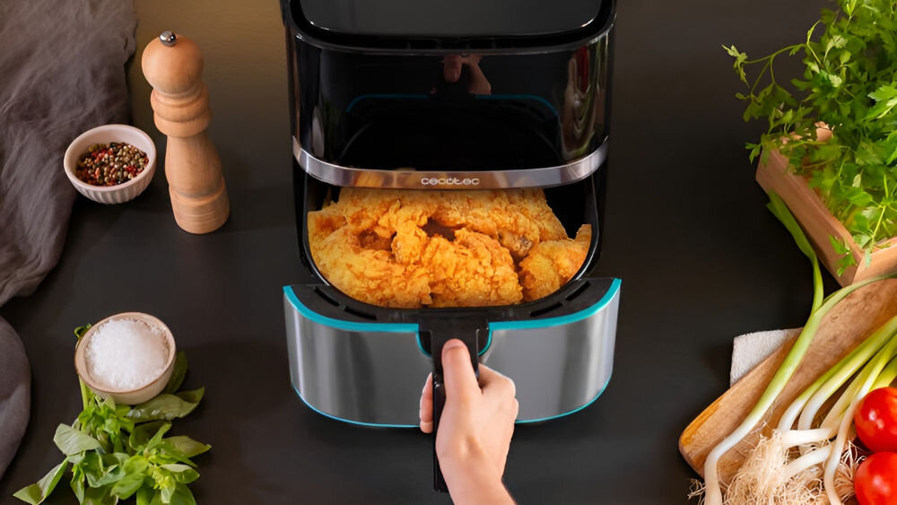 Frytkownica beztłuszczowa CECOTEC Cecofry Full InoxBlack 5500 Pro Air Fryer duża pojemność 5,5 l jednorazowe przygotowanie większej ilości jedzenia dla całej rodziny grupy przyjaciół duża pojemność naczynia codzienne obiady większe przyjęcia spotkania towarzyskie oszczędność czasu i wysiłku