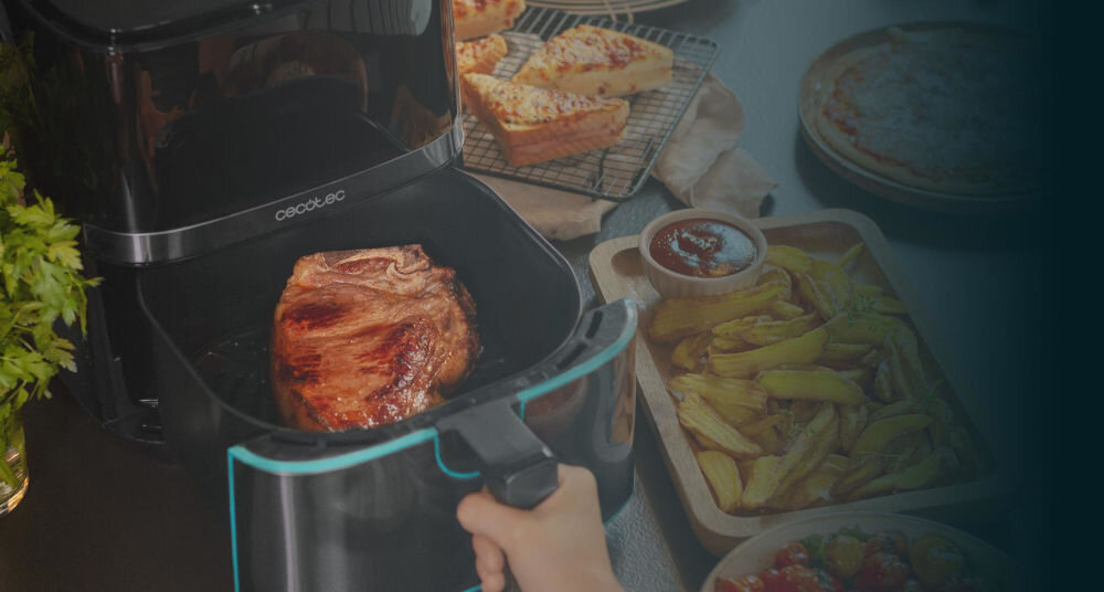 Frytkownica beztłuszczowa CECOTEC Cecofry Full InoxBlack 5500 Pro Air Fryer moc 1700 W szybkie skuteczne gotowanie wysoka moc skrócenie czasu przygotowywania potraw przydatne w dynamicznym trybie życia oszczędność czasu energii smaczne posiłki w krótszym czasie